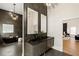 Luxurious bathroom featuring a soaking tub, double vanity, and elegant fixtures at 1041 Walker Se Ave, Atlanta, GA 30316