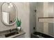 Chic bathroom featuring a modern vanity, a soaking tub, and contemporary fixtures at 1041 Walker Se Ave, Atlanta, GA 30316