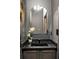 Modern powder room with a black sink, decorative mirror and dark walls at 1041 Walker Se Ave, Atlanta, GA 30316