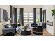 Bright living room featuring a modern fireplace, chic decor, and a stylish seating arrangement at 1041 Walker Se Ave, Atlanta, GA 30316
