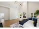 Spacious main bedroom with ample natural light, fireplace, hardwood flooring, and access to patio at 1041 Walker Se Ave, Atlanta, GA 30316