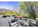 Inviting patio with comfortable seating, a fire pit, and cornhole boards, perfect for outdoor relaxation at 1041 Walker Se Ave, Atlanta, GA 30316