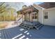 Enjoy outdoor living on this beautiful back deck with pergola and steps to the yard at 105 Condor Ct, Woodstock, GA 30188