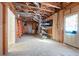 Unfinished basement with exposed beams, great for storage or future expansion at 105 Condor Ct, Woodstock, GA 30188