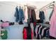 Walk-in closet featuring ample storage with shelving and racks at 105 Condor Ct, Woodstock, GA 30188