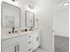 Modern bathroom with double vanity, marble floors, and sleek black fixtures at 2860 3Rd Sw Ave, Atlanta, GA 30315