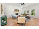 Bright and airy living room with hardwood floors, a fireplace, and large windows with a view of the outdoors at 2860 3Rd Sw Ave, Atlanta, GA 30315