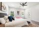 Spacious primary bedroom with modern accents, bathroom access, and natural light at 2860 3Rd Sw Ave, Atlanta, GA 30315