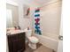 Bathroom with tub and shower combination and modern fixtures at 6338 Kinsland Ct, Lithonia, GA 30058