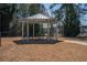 Outdoor gazebo with picnic tables, perfect for relaxing and enjoying the outdoors at 6338 Kinsland Ct, Lithonia, GA 30058