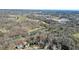 Bird's eye view of home near lake and green space with school and playing fields nearby at 4460 Wimberly Way, Cumming, GA 30028