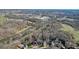 Overhead angle reveals property location near pond and school at 4460 Wimberly Way, Cumming, GA 30028