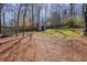 Extensive backyard with a gazebo and shed, offering plenty of space for outdoor enjoyment and storage at 4460 Wimberly Way, Cumming, GA 30028