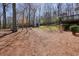 Expansive backyard with a gazebo and shed, perfect for storage and outdoor activities at 4460 Wimberly Way, Cumming, GA 30028