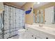 Nautical themed bathroom featuring a blue and white shower curtain and accents at 4460 Wimberly Way, Cumming, GA 30028