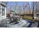 Outdoor deck with table, chairs, umbrella, and grill, great for entertaining and enjoying the backyard at 4460 Wimberly Way, Cumming, GA 30028