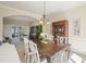 Elegant dining room with a wooden table and chairs, plus classic decor, great for entertaining at 4460 Wimberly Way, Cumming, GA 30028