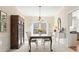 Elegant dining area with beautiful natural light, and stylish decor for a comfortable ambiance at 4460 Wimberly Way, Cumming, GA 30028