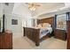 Spacious main bedroom with a tray ceiling and a ceiling fan and blue accents at 4460 Wimberly Way, Cumming, GA 30028