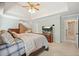 Spacious main bedroom featuring a tray ceiling and adjacent bonus room at 4460 Wimberly Way, Cumming, GA 30028