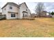 An expansive backyard features a wooden deck, lush greenery and provides plenty of room for outdoor activities and relaxation at 4871 Ship Jack Ln, Decatur, GA 30035