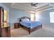 Primary bedroom with a trey ceiling, a ceiling fan and a large bed at 4871 Ship Jack Ln, Decatur, GA 30035