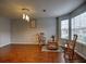 Living room featuring new hardwood floors, light gray walls, and lots of light at 4871 Ship Jack Ln, Decatur, GA 30035