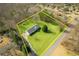 Aerial view of the property highlighting its large lot and well-manicured lawn at 6365 Mountain View Trl, Cumming, GA 30041