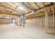 Spacious unfinished basement with high ceilings and concrete walls, ready for customization at 6365 Mountain View Trl, Cumming, GA 30041