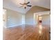 Expansive living room with vaulted ceilings, hardwood floors, and ample space at 6365 Mountain View Trl, Cumming, GA 30041