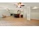 Finished basement with bar, fireplace, and light wood-look flooring, great for entertaining or relaxing at 8056 Revere Dr, Mcdonough, GA 30252