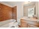Traditional bathroom with tiled shower, white vanity, and neutral wall paint creating a relaxing ambiance at 8056 Revere Dr, Mcdonough, GA 30252