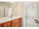 Bathroom featuring granite vanity with white sink and tub/shower combination at 8056 Revere Dr, Mcdonough, GA 30252