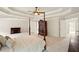 Main bedroom with trey ceilings, fireplace, hardwood furnishings, and lots of space at 8056 Revere Dr, Mcdonough, GA 30252