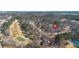Aerial view features this beautiful community with houses, golf course and tennis courts at 8424 Fairway Dr, Covington, GA 30014