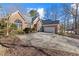 Beautiful brick home with an attached garage and a concrete driveway at 8424 Fairway Dr, Covington, GA 30014