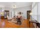 Formal living room featuring hardwood floors, neutral walls, and natural light at 8424 Fairway Dr, Covington, GA 30014