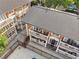 Aerial view of buildings with private balconies and a fenced pool area at 885 Briarcliff Ne Rd # 16, Atlanta, GA 30306
