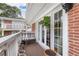 Cozy balcony with potted plants, seating, and view of the yard at 885 Briarcliff Ne Rd # 16, Atlanta, GA 30306