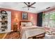 Cozy bedroom with plush decor and bedside table lamps featuring an abundance of natural light at 885 Briarcliff Ne Rd # 16, Atlanta, GA 30306