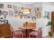 Cozy breakfast nook with unique gallery wall, built-in seating, and hardwood floors at 885 Briarcliff Ne Rd # 16, Atlanta, GA 30306