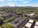 An aerial view of the neighborhood with the city skyline in the background at 885 Briarcliff Ne Rd # 16, Atlanta, GA 30306