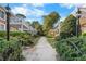 Exterior view of walking path with landscaping and outdoor lighting at 885 Briarcliff Ne Rd # 16, Atlanta, GA 30306