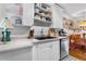 Well-lit kitchen with stainless steel appliances, open shelving, and breakfast nook at 885 Briarcliff Ne Rd # 16, Atlanta, GA 30306