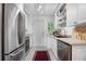 Bright kitchen with stainless steel appliances, sleek countertops, and patterned tile flooring at 885 Briarcliff Ne Rd # 16, Atlanta, GA 30306