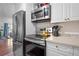 Modern kitchen with stainless steel appliances, sleek cooktop, and stylish finishes at 885 Briarcliff Ne Rd # 16, Atlanta, GA 30306