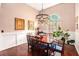 Elegant dining room with wood accents, complemented by a chandelier and natural light at 97 Old Burnt Hickory Rd, Acworth, GA 30101