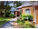 Attractive brick house with well-maintained front yard landscaping and mature bushes at 97 Old Burnt Hickory Rd, Acworth, GA 30101