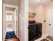 Convenient laundry room with modern washer and dryer adjacent to bathroom and bedroom at 97 Old Burnt Hickory Rd, Acworth, GA 30101