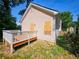 Rear exterior of the home showcasing the deck and back of the house with boarded-up windows at 1059 Sims Sw St, Atlanta, GA 30310